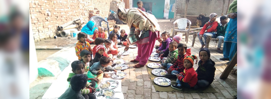 Serving nutrition food to poor children